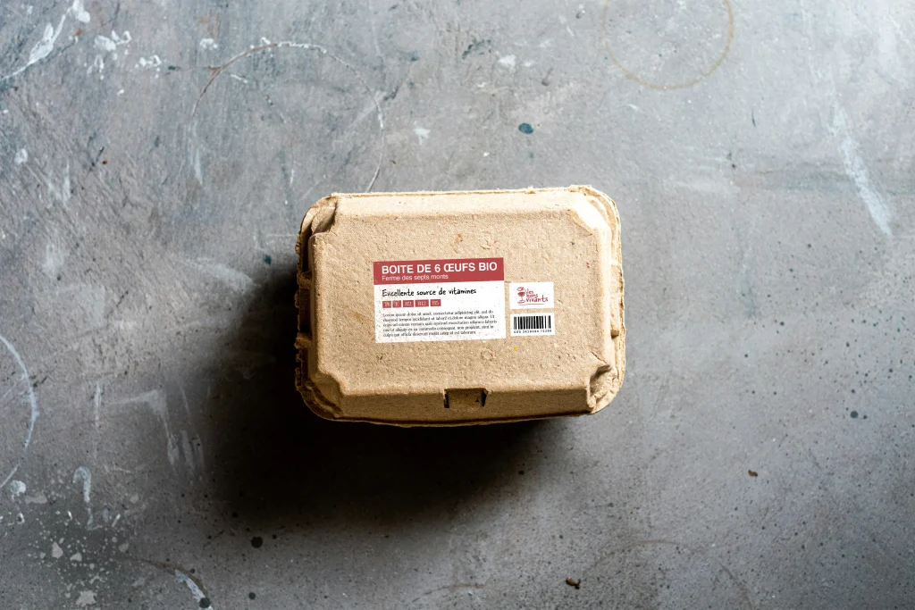 Design d'un packaging de boite d'oeufs.